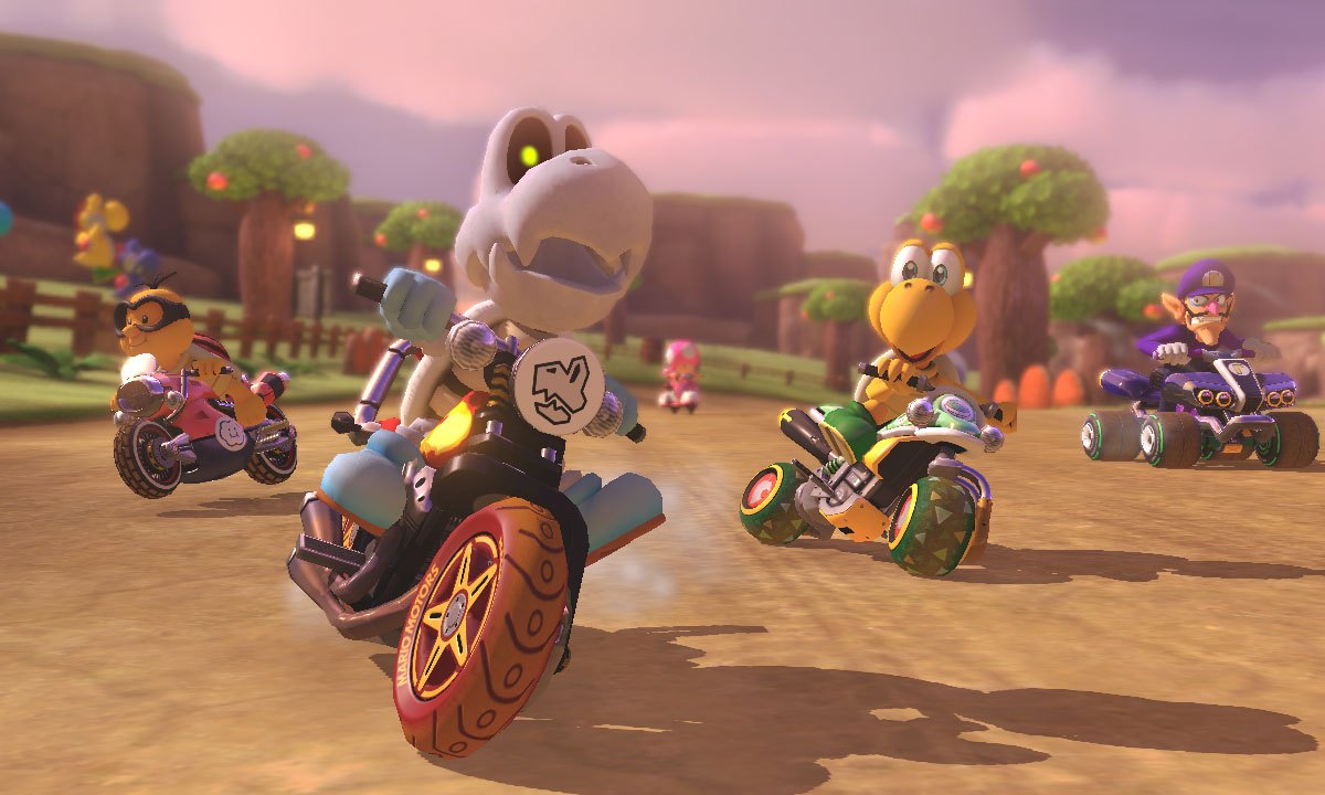 Dry Bones and Koopa compete in a Mario Kart race.