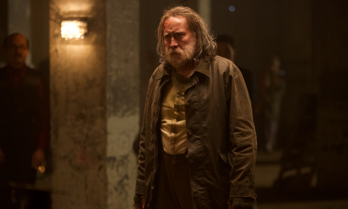 Nicolas Cage standing in a beard in Pig.